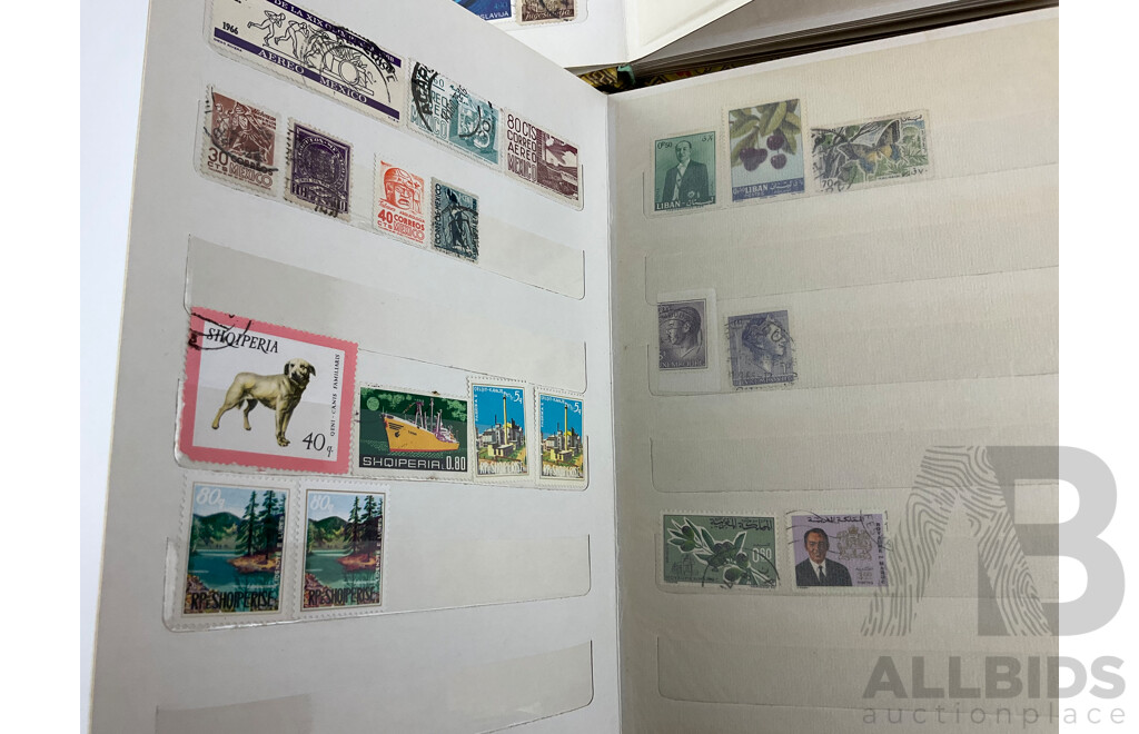 Two Albums of Vintage Cancelled Stamps Including Iraq, Germany, Falkland Islands, St Lucia, Yugoslavia