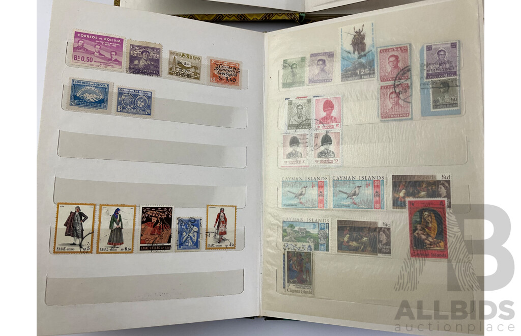 Two Albums of Vintage Cancelled Stamps Including Iraq, Germany, Falkland Islands, St Lucia, Yugoslavia