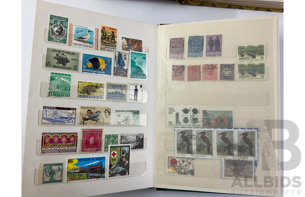 Two Albums of Vintage Cancelled Stamps Including Iraq, Germany, Falkland Islands, St Lucia, Yugoslavia