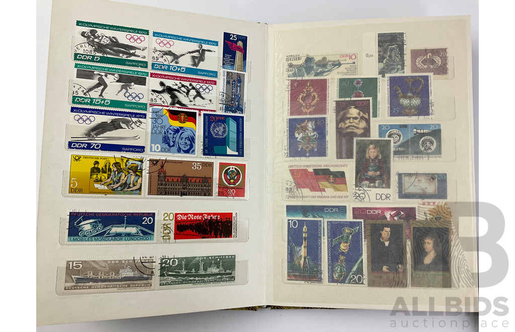 Two Albums of Vintage Cancelled Stamps Including Iraq, Germany, Falkland Islands, St Lucia, Yugoslavia