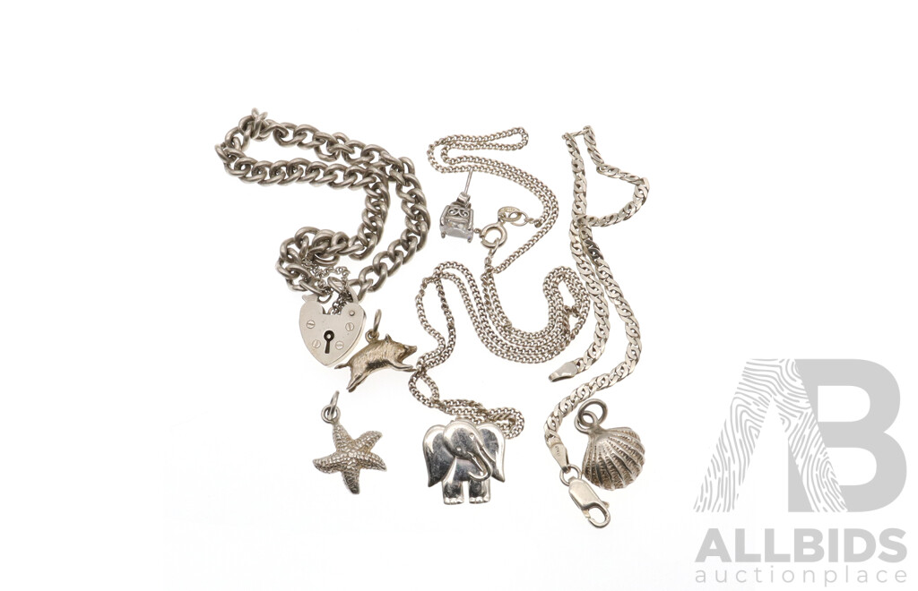 Collection of Sterling Silver Jewellery Items Including Bracelets, Necklace and Charms, 34.57 Grams