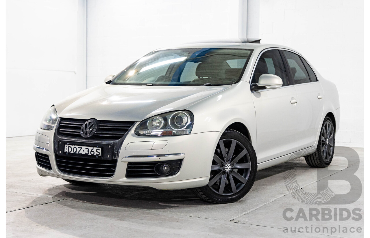 5/2010 Volkswagen Jetta 125 TDI Highline 1KM MY10 4d Sedan Silver Leaf Metallic Turbo Diesel 2.0L