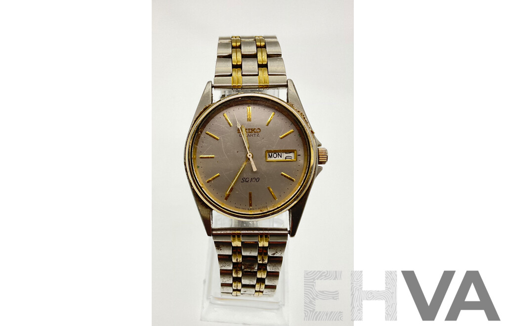 Vintage Seiko SQ100 Gold and Silver Tone Wrist Watch