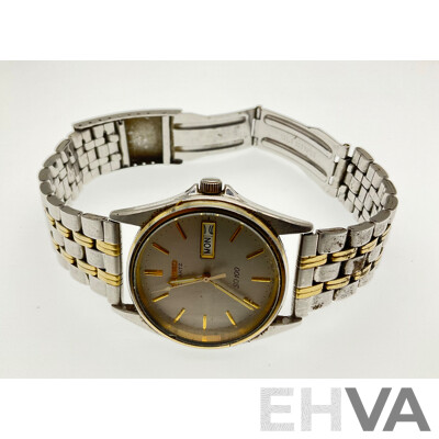 Vintage Seiko SQ100 Gold and Silver Tone Wrist Watch