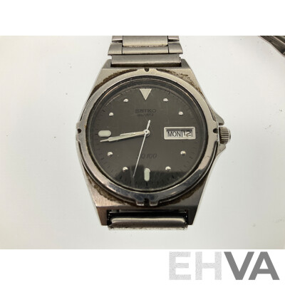 Vintage Seiko SQ100 Gold and Silver Tone Wrist Watch