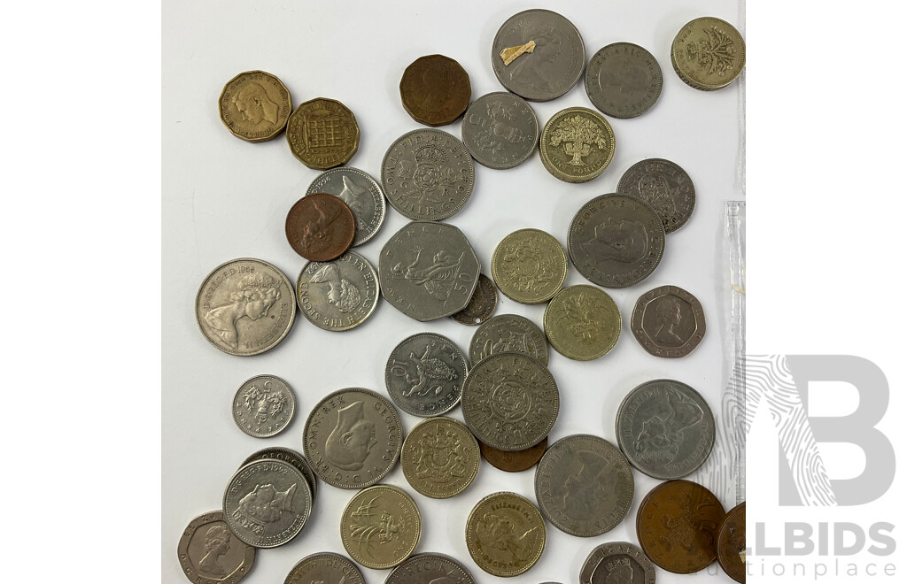 Collection of United Kingdom Coins Including 1876 Silver Shilling, 1921 Silver Florin, One Pound Coins and More