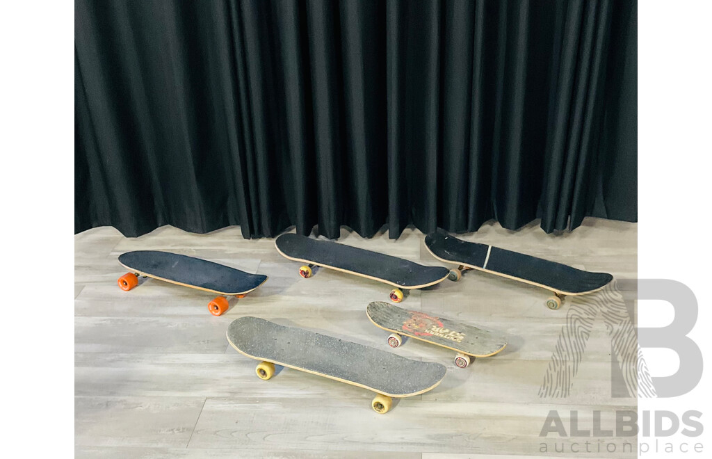 Collection of Skateboards of Varying Designs and Sizes