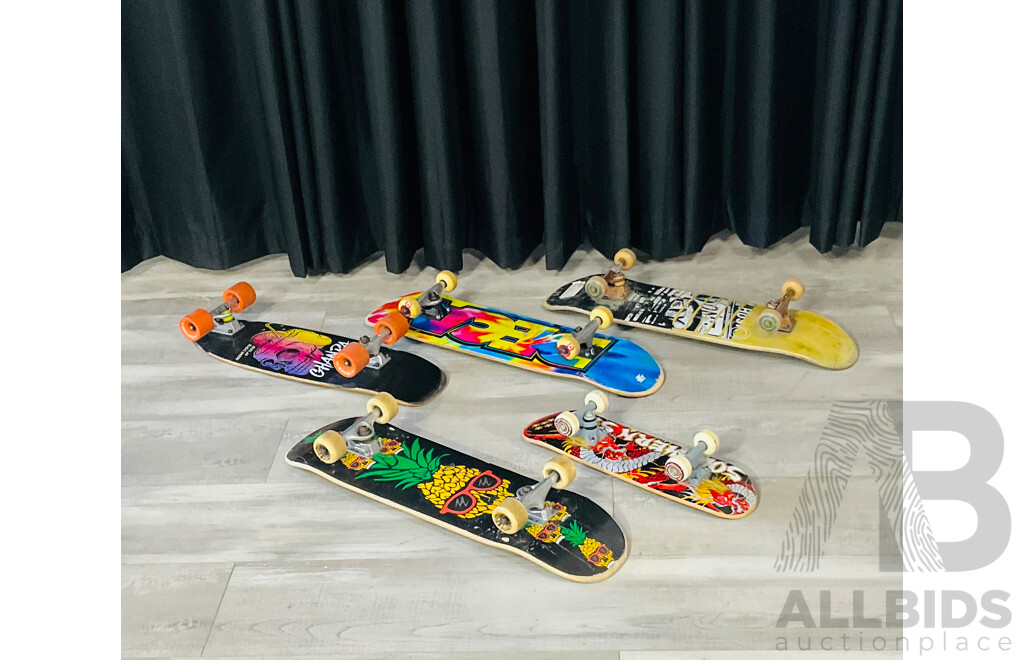 Collection of Skateboards of Varying Designs and Sizes