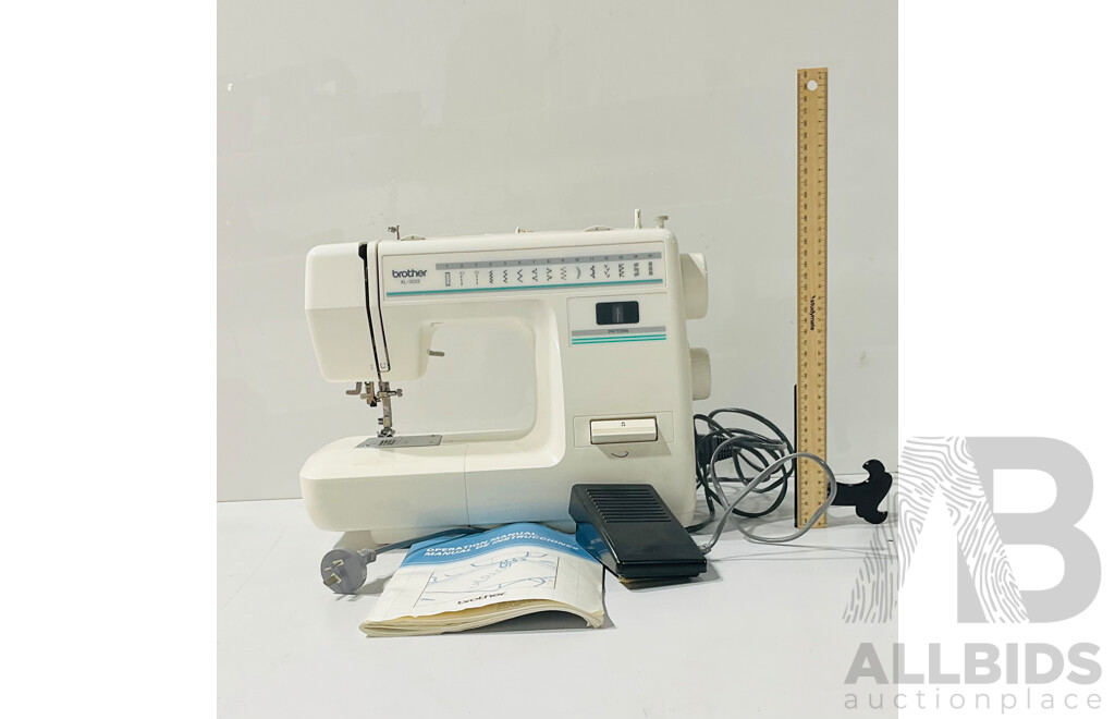 Retro Brothers XL-3022 Sewing Machine with Protective Covering and Original Instruction Manual