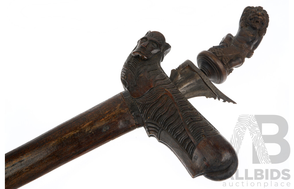 Antique South East Asian Madura Kris with Damascus Blade, Buta Nawasari Demon Motif Wooden Handle, Wooden Sheath and Singha Motif Top