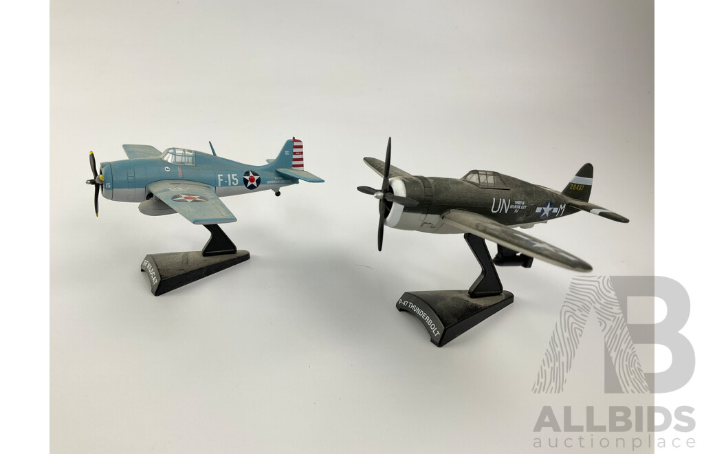 Six Diecast Military Propeller Aircraft on Display Stands Including F4U Corsair, P51D Mustang, P-47 Thunderbolt, A-1Hskyraider, F4F Wildcat, P-38 Lightning