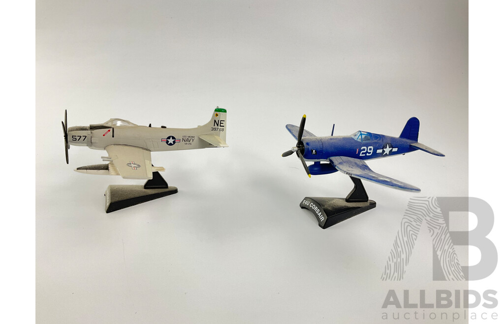 Six Diecast Military Propeller Aircraft on Display Stands Including F4U Corsair, P51D Mustang, P-47 Thunderbolt, A-1Hskyraider, F4F Wildcat, P-38 Lightning