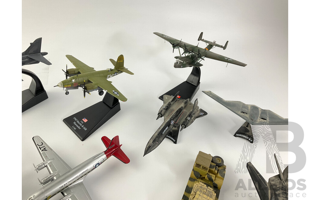 Collection of Diecast and Plastic Military Aircraft and Vehicles Including SR-71 Blackbird, Lockheed Night Hawk, Dornier DO 24T, F-117 Stealth and More