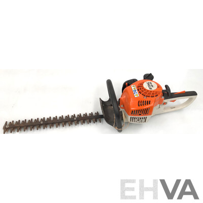 Stihl HS45 Petrol Powered Hedge Trimmer and Rockwell RG8070 Electric Hedge Trimmer