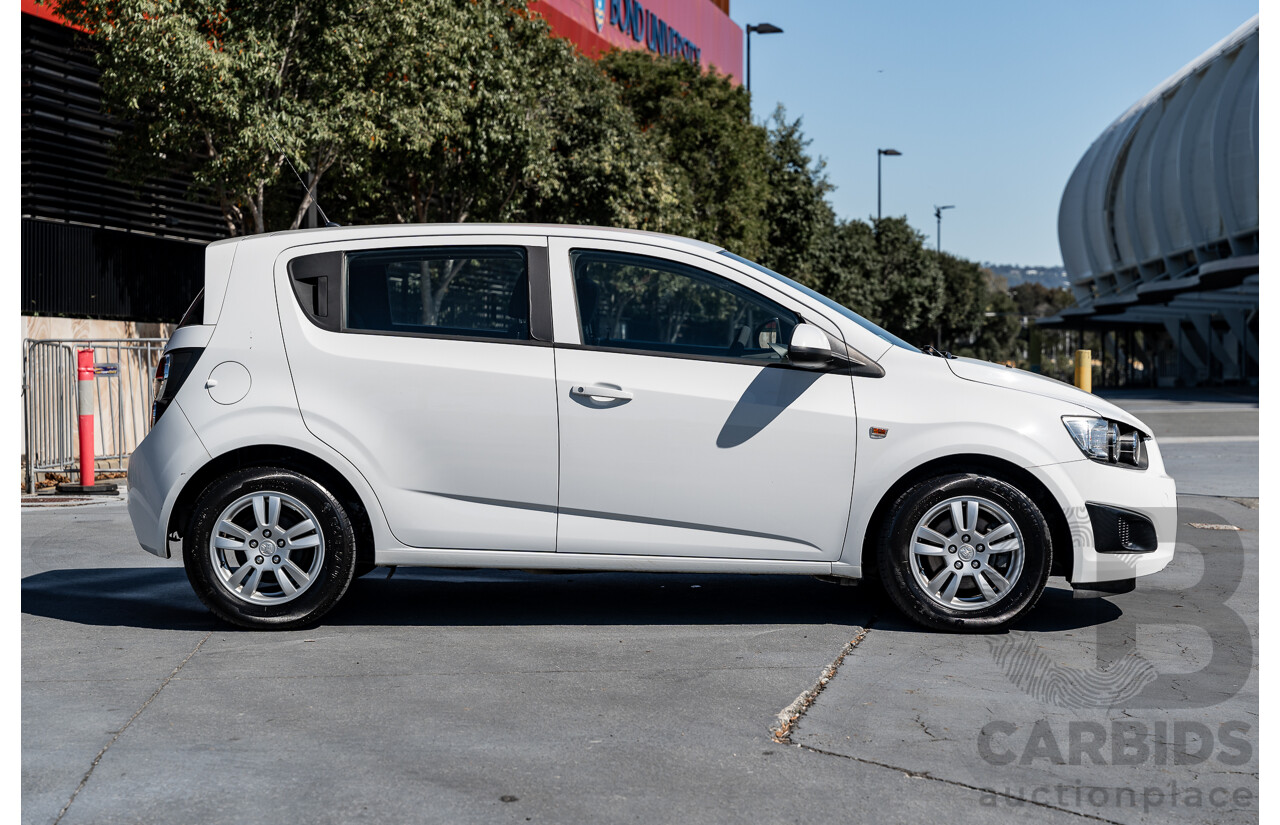 5/2013 Holden Barina CD TM MY13 5d Hatchback Summit White 1.6L