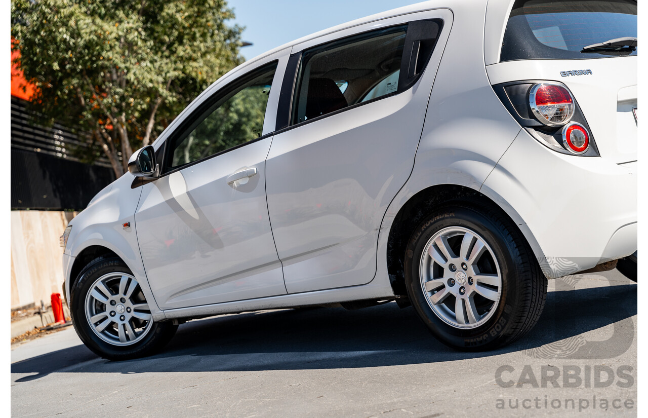 5/2013 Holden Barina CD TM MY13 5d Hatchback Summit White 1.6L