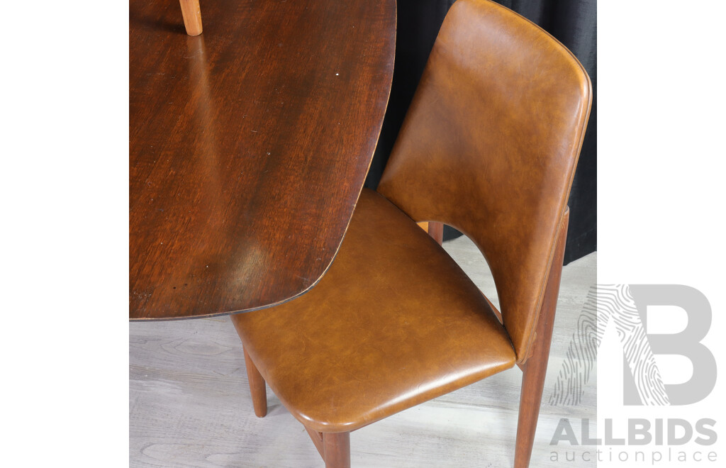 Mid Century Teak Dining Table with Brass Capped Legs and Four Vinyl Upholstered Chairs