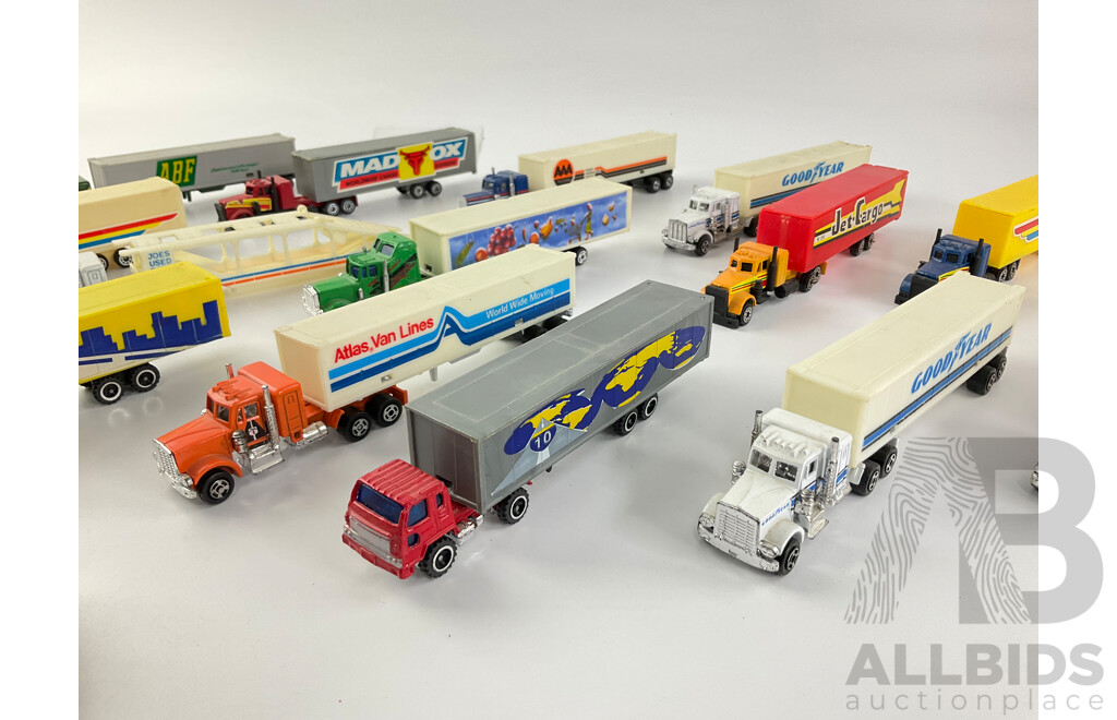 Collection of Diecast Semi Trailer Trucks Including Goodyear and Firestone