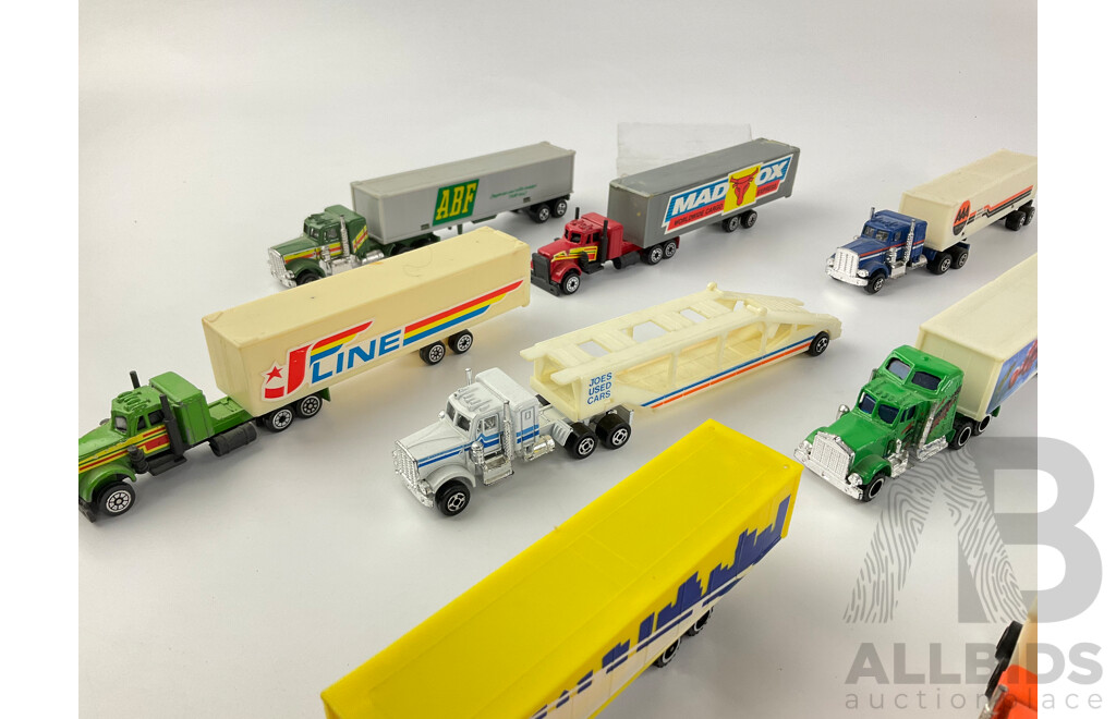 Collection of Diecast Semi Trailer Trucks Including Goodyear and Firestone