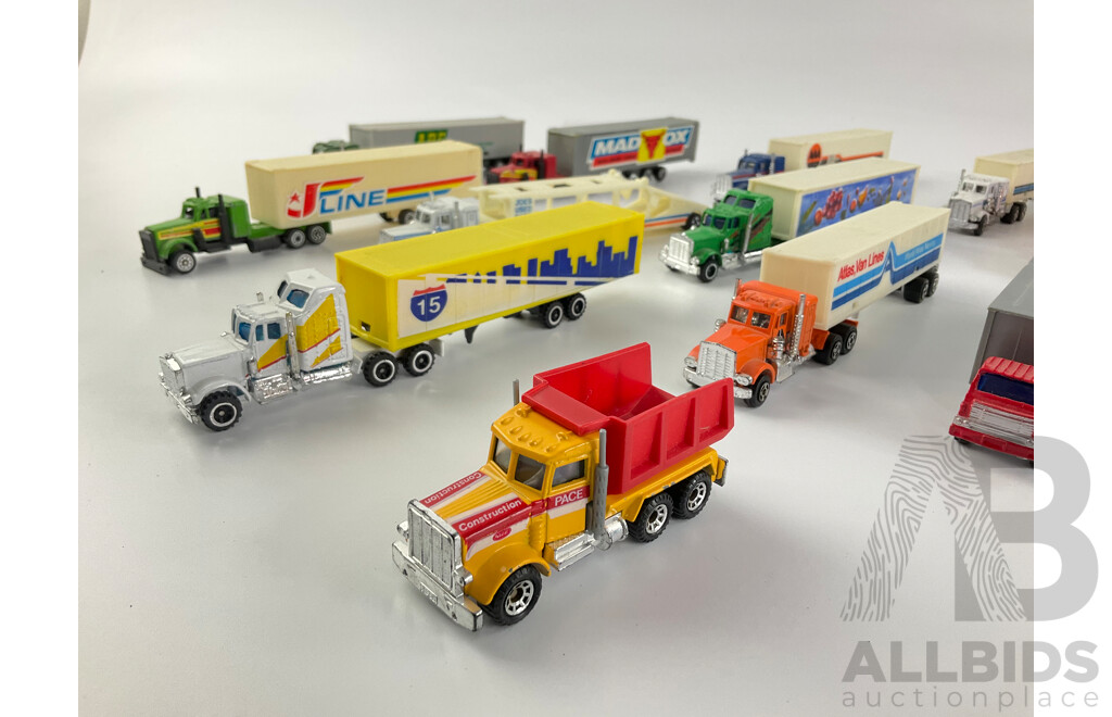 Collection of Diecast Semi Trailer Trucks Including Goodyear and Firestone