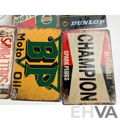 Ten Reproduction Steel Signs Including BP, Shell, Indian, Mobiloil, Champion, Mack, Castrol, Dunlop