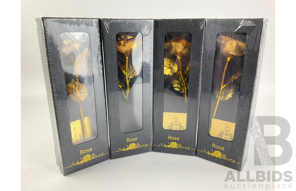 Four Boxed Gold Tone Roses