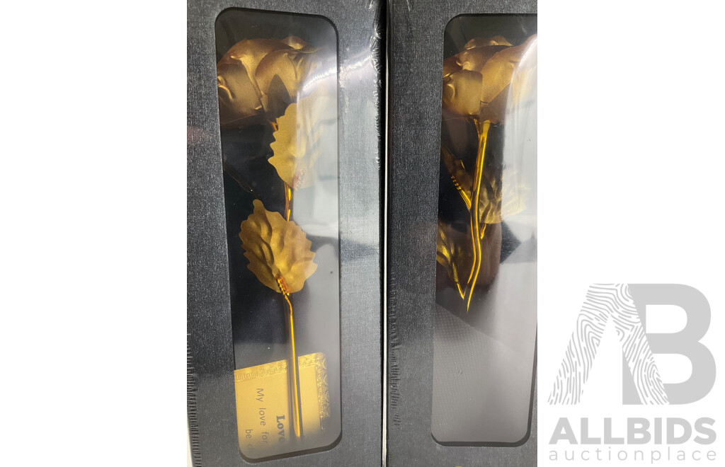 Four Boxed Gold Tone Roses