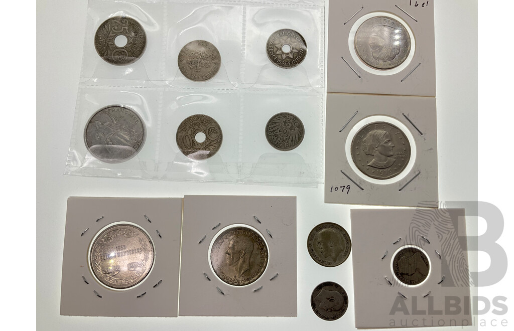 Two USA 1979 One Dollar Coins, France 1929 Ten and 1930 Twenty Five Centimes, Germany 1900 Five Pfenning, New Guinea 1935 Six Pence, UK 1908 and 1898 Threepence, 1972 Blackpool FA Cup Coin