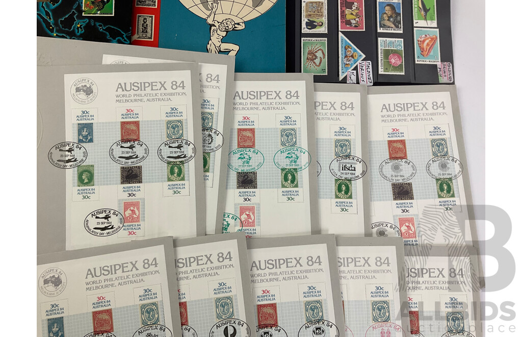 Collection of International Stamps Including Ten Australian 1984 AUSIPEX Covers, Maldives 1970's Mint Stamps, Two Stamp Albums of Cancelled Stamps, Empty Australian Stamp Albums 1981, 1985, 1987