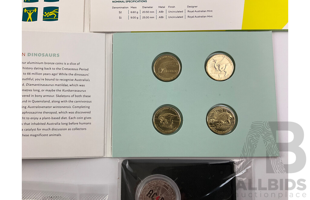 Five Australian RAM 2021 Two Dollar Coins, Indigenous Military Service, 2023 Fifty Cent AC/DC Fiftieth Anniversary, 2022 One Dollar Dinosaur Set, 2022 Commonwealth Games Seven Coin Set