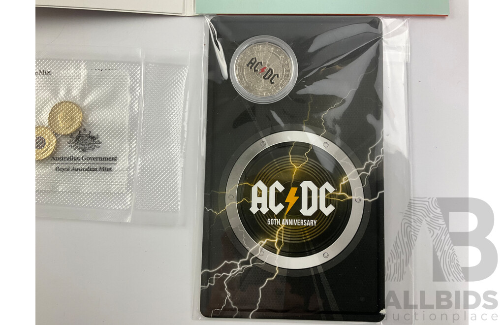 Five Australian RAM 2021 Two Dollar Coins, Indigenous Military Service, 2023 Fifty Cent AC/DC Fiftieth Anniversary, 2022 One Dollar Dinosaur Set, 2022 Commonwealth Games Seven Coin Set