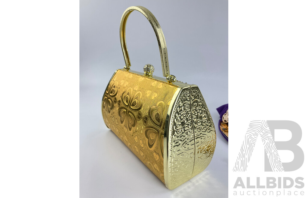 Hard Case Gold Tone Handbag Adorned with Faux Diamond and Pearls with Purple and Gold Hat with Studs and Badges