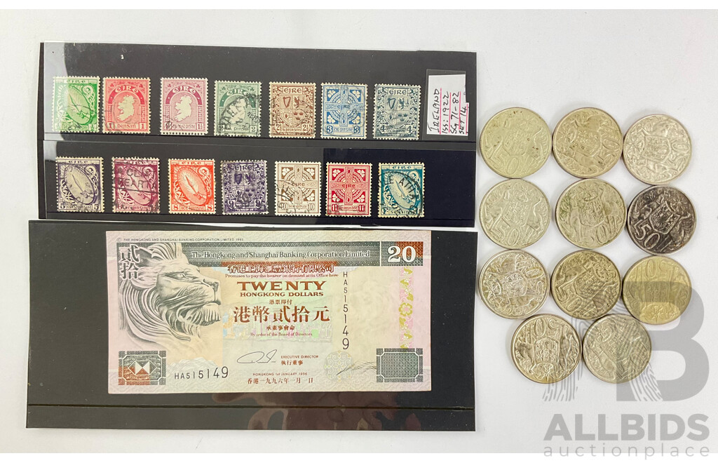 Eleven Australian 1966 Silver Round Fifty Cent Coins with Hong Kong 1996 Twenty Dollar Note and Ireland 1922 Stamps