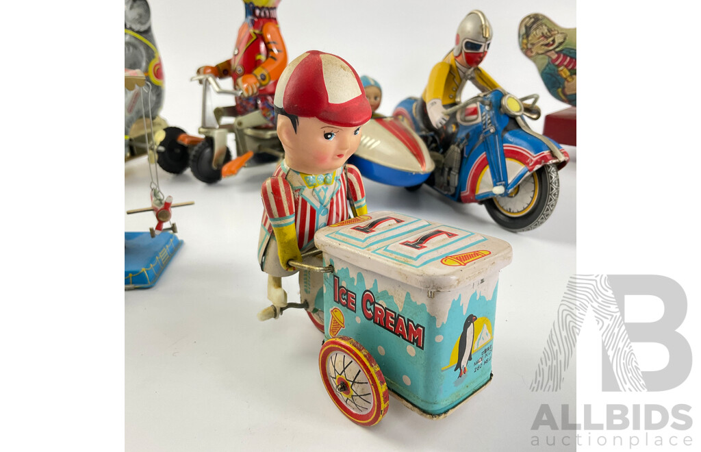 Vintage Pressed Steel Clockwork Toys Including Elephant and Duck on Tricycles, Motorcycle and Side Car, Chicken Sea Saw, Plane Carousel, Pecking Chicken, Ice Cream Cart, All Made in China with Peg Leg Tug Boat