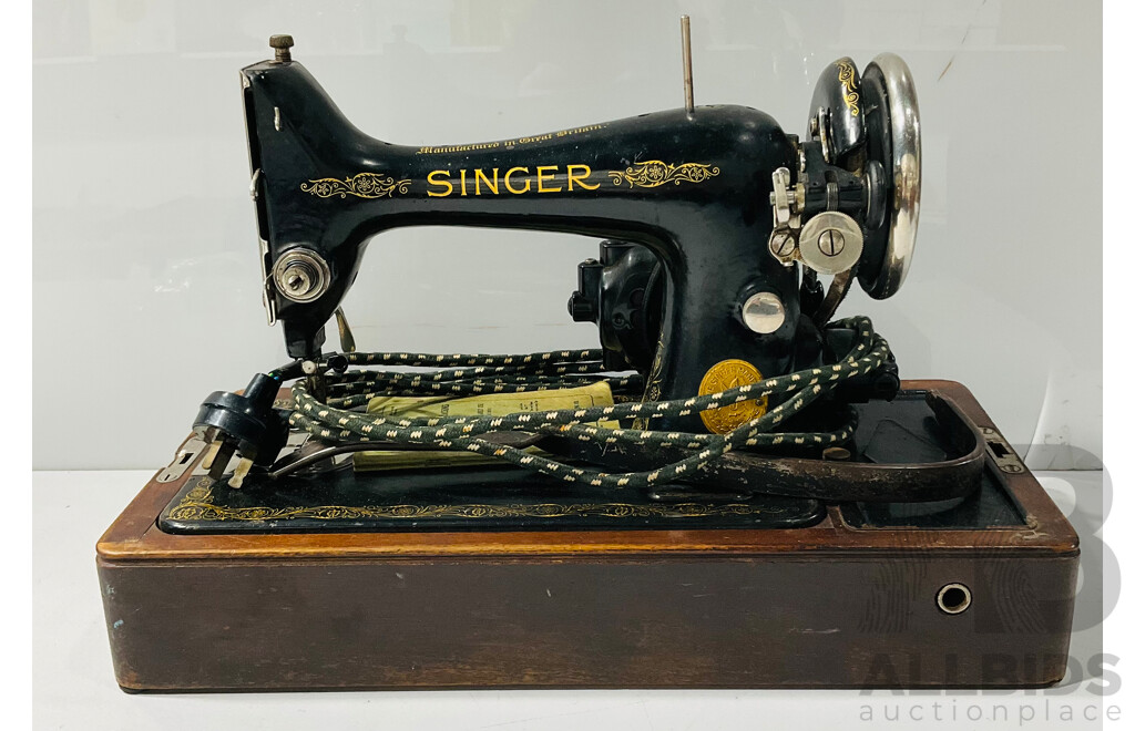 Pair of Vintage Singer Electric Sewing Machines