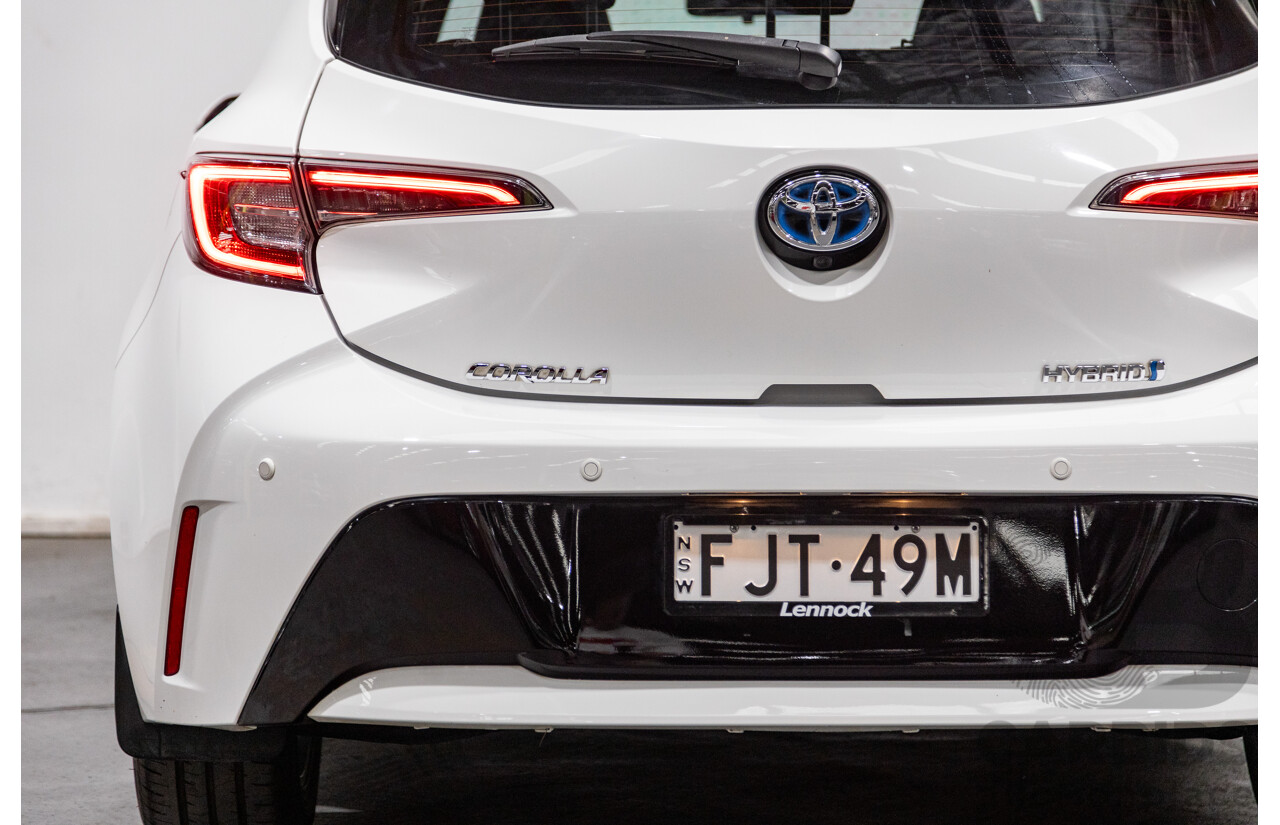 11/2020 Toyota Corolla Ascent Sport Hybrid ZWE211R MY21 4d Hatch White 1.8L / 90kW Hybrid