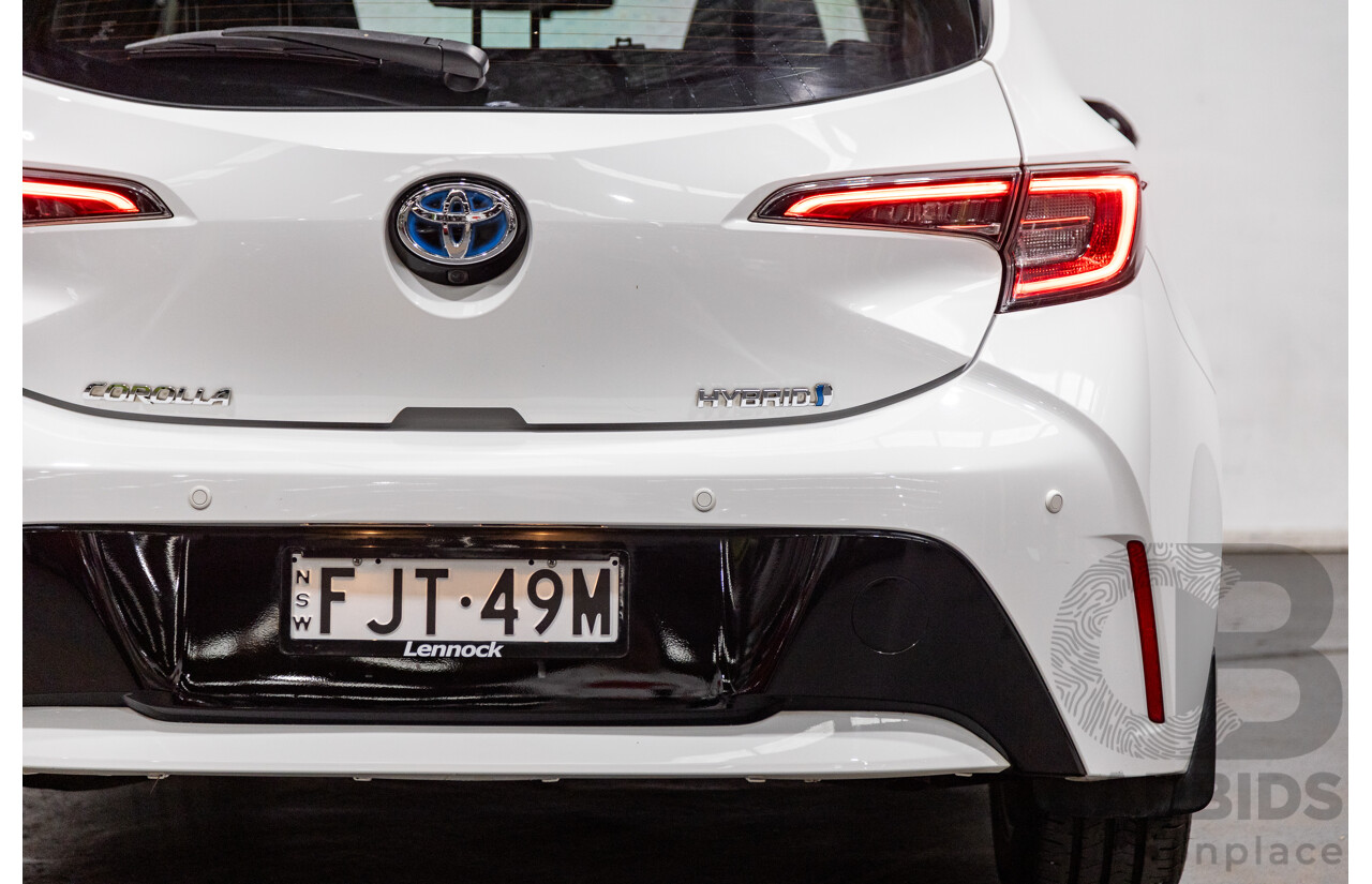 11/2020 Toyota Corolla Ascent Sport Hybrid ZWE211R MY21 4d Hatch White 1.8L / 90kW Hybrid