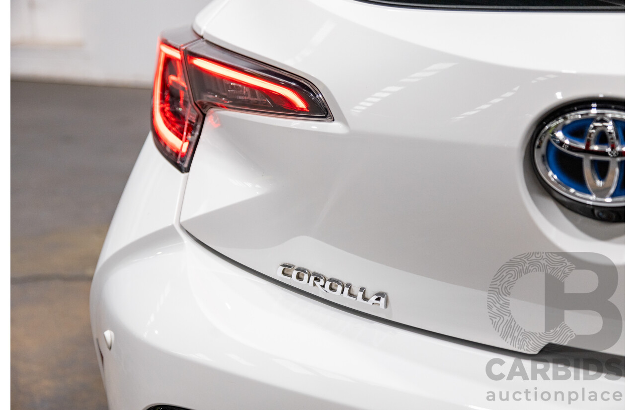 11/2020 Toyota Corolla Ascent Sport Hybrid ZWE211R MY21 4d Hatch White 1.8L / 90kW Hybrid