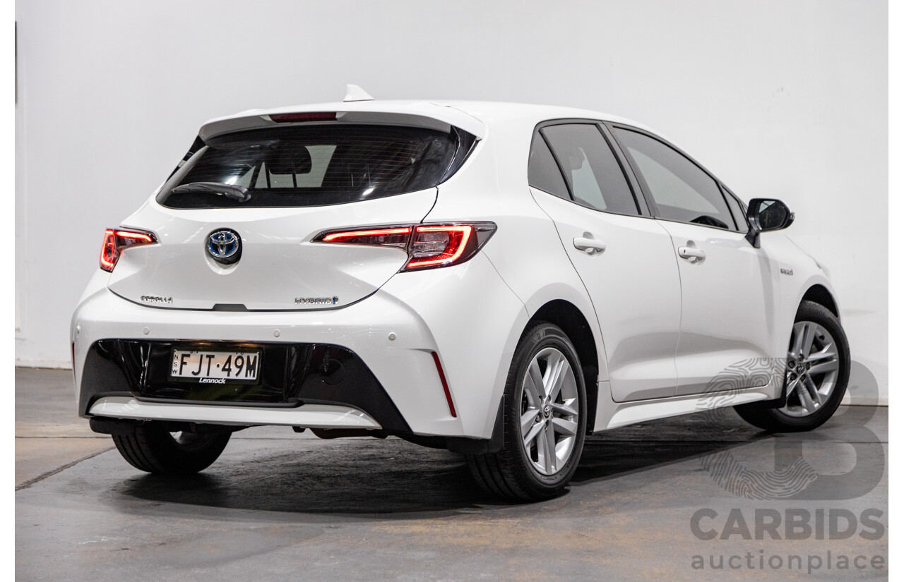 11/2020 Toyota Corolla Ascent Sport Hybrid ZWE211R MY21 4d Hatch White 1.8L / 90kW Hybrid