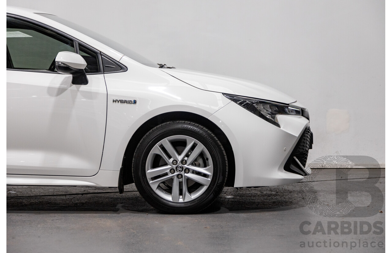 11/2020 Toyota Corolla Ascent Sport Hybrid ZWE211R MY21 4d Hatch White 1.8L / 90kW Hybrid