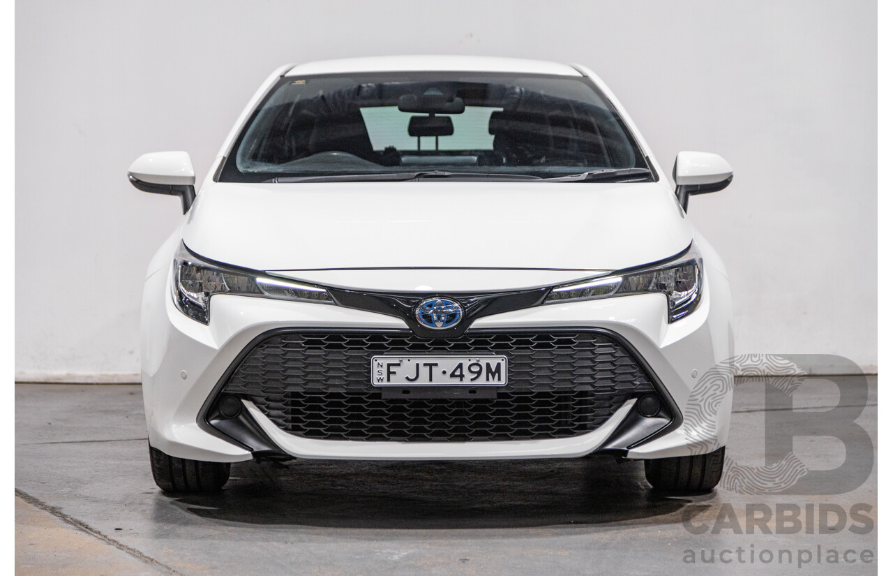 11/2020 Toyota Corolla Ascent Sport Hybrid ZWE211R MY21 4d Hatch White 1.8L / 90kW Hybrid