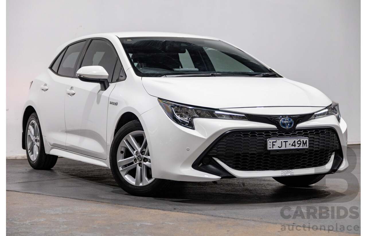 11/2020 Toyota Corolla Ascent Sport Hybrid ZWE211R MY21 4d Hatch White 1.8L / 90kW Hybrid