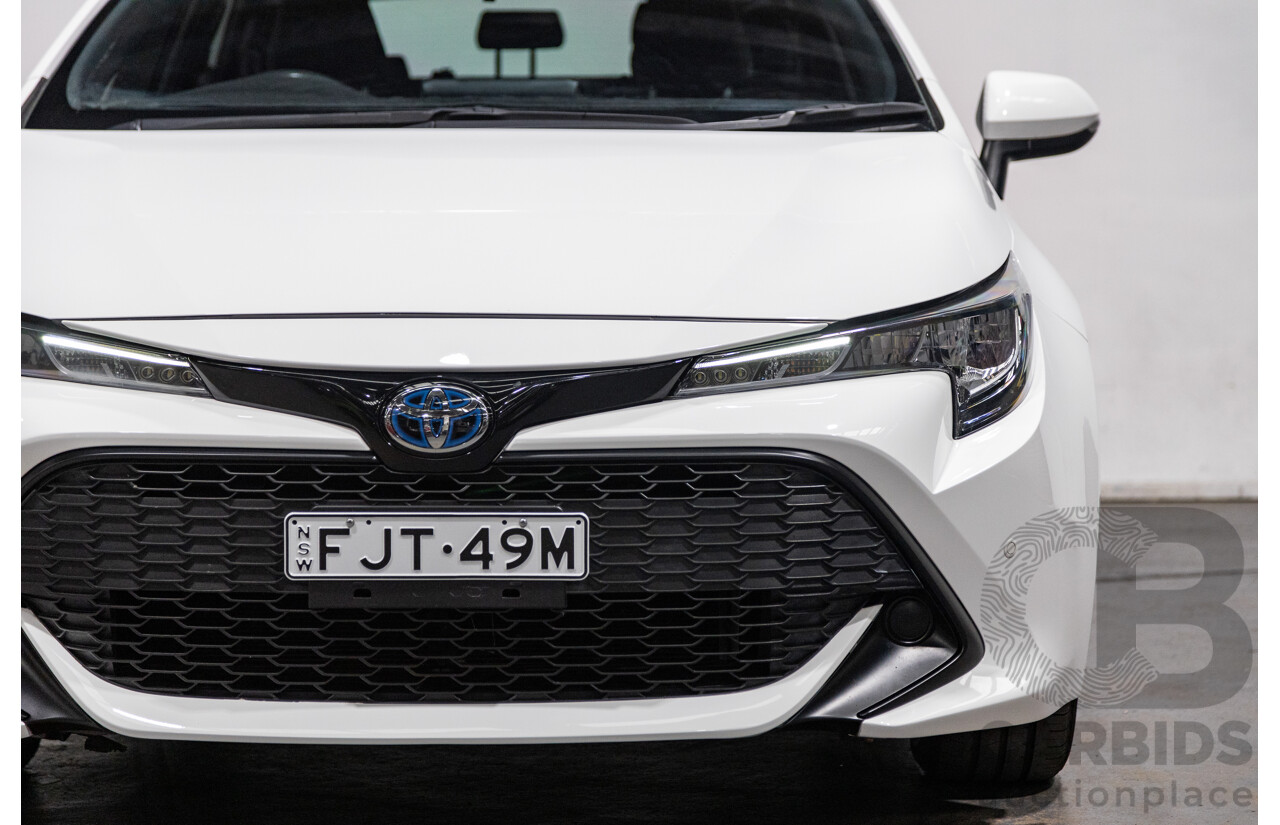 11/2020 Toyota Corolla Ascent Sport Hybrid ZWE211R MY21 4d Hatch White 1.8L / 90kW Hybrid