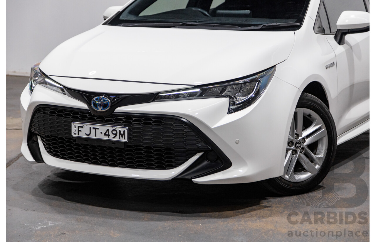 11/2020 Toyota Corolla Ascent Sport Hybrid ZWE211R MY21 4d Hatch White 1.8L / 90kW Hybrid