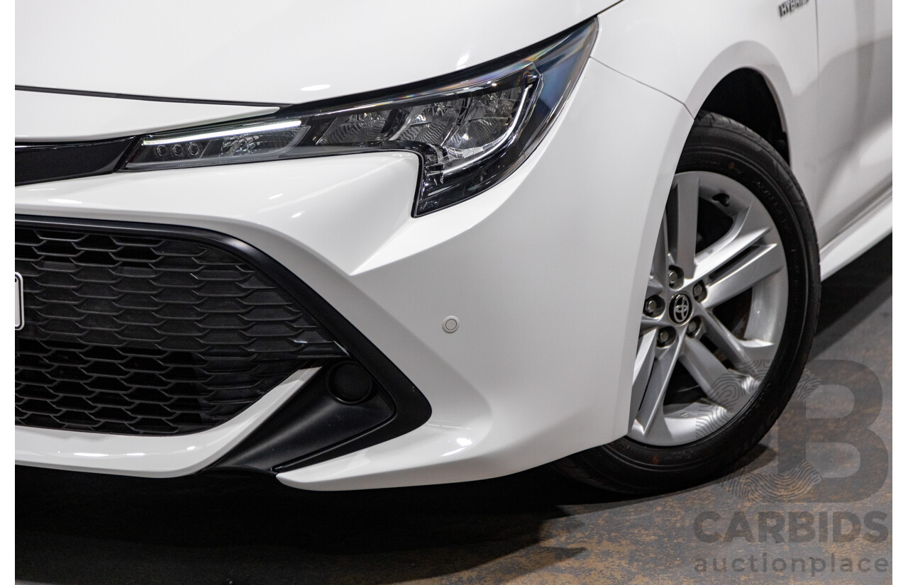 11/2020 Toyota Corolla Ascent Sport Hybrid ZWE211R MY21 4d Hatch White 1.8L / 90kW Hybrid