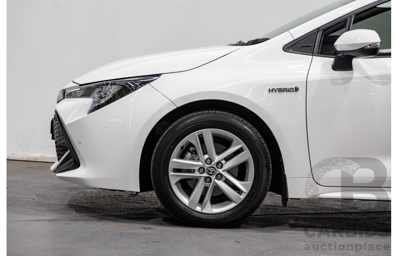 11/2020 Toyota Corolla Ascent Sport Hybrid ZWE211R MY21 4d Hatch White 1.8L / 90kW Hybrid