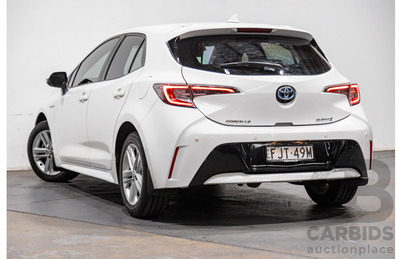 11/2020 Toyota Corolla Ascent Sport Hybrid ZWE211R MY21 4d Hatch White 1.8L / 90kW Hybrid