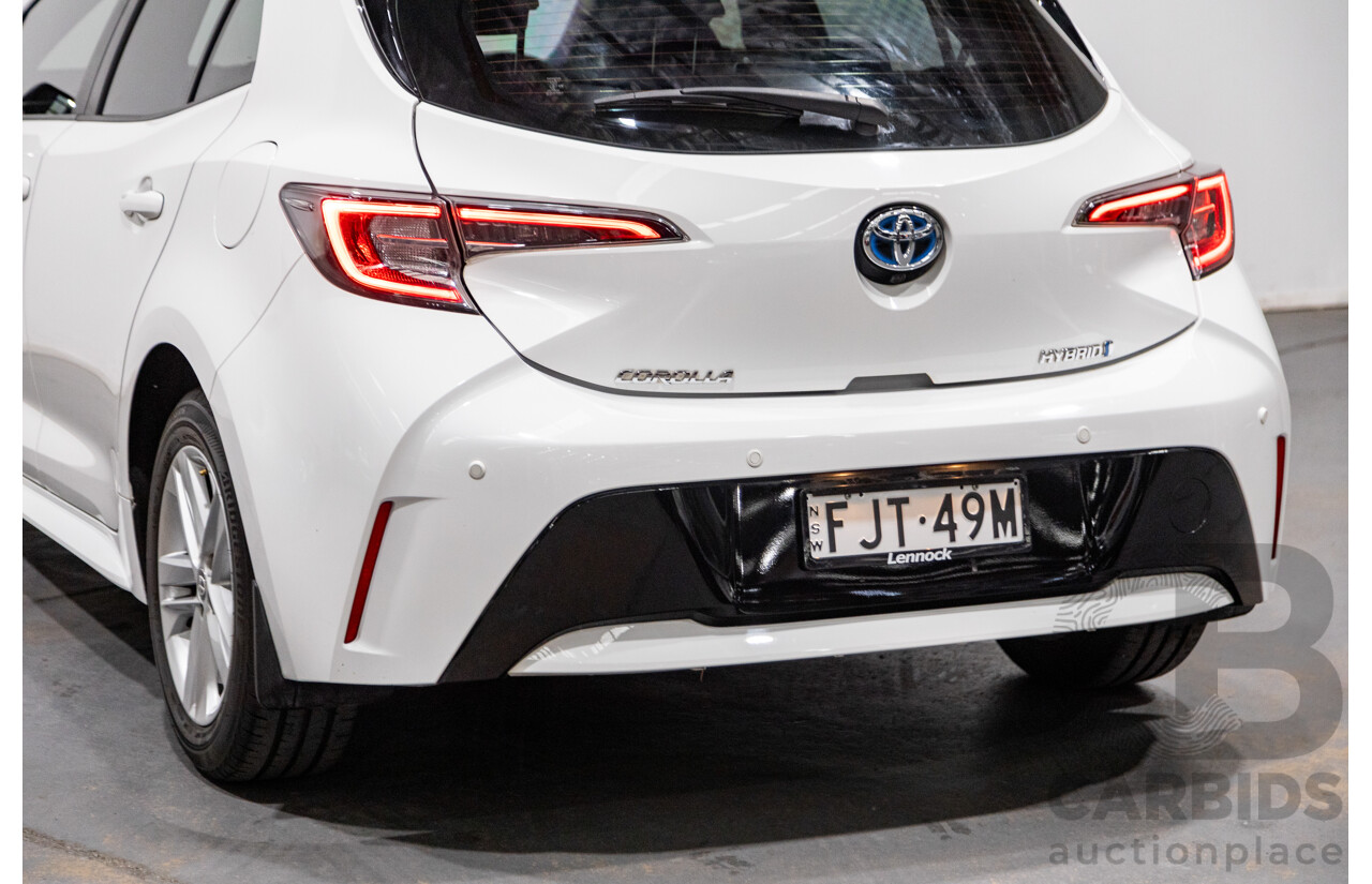 11/2020 Toyota Corolla Ascent Sport Hybrid ZWE211R MY21 4d Hatch White 1.8L / 90kW Hybrid