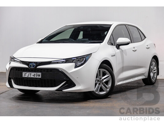 11/2020 Toyota Corolla Ascent Sport Hybrid ZWE211R MY21 4d Hatch White 1.8L / 90kW Hybrid