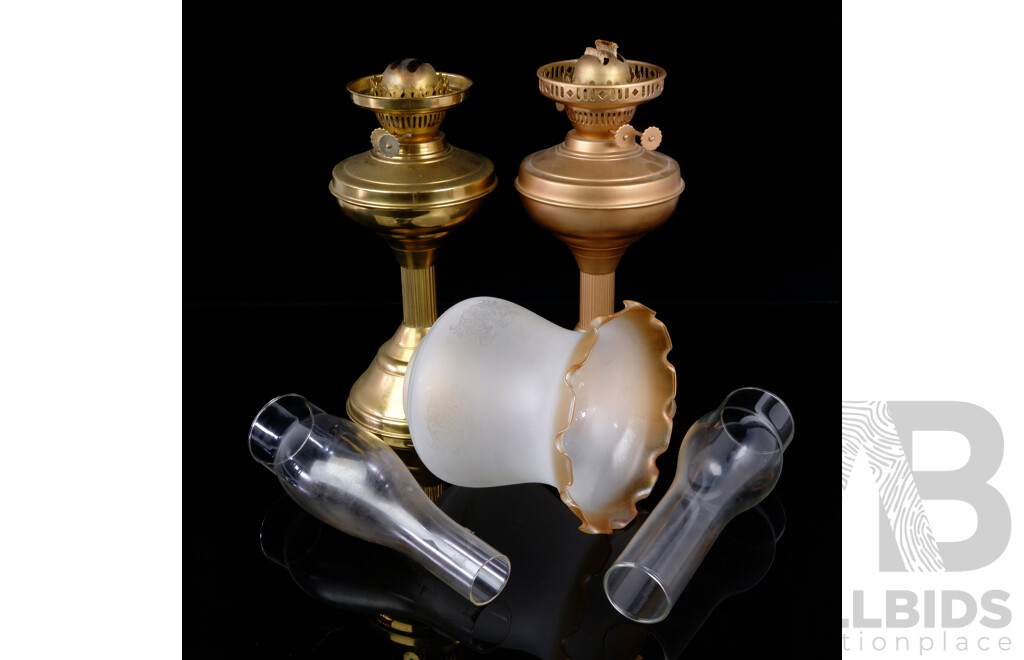 Pair Antique Style Brass Oil Lamp Bases One with Glass Shade and Flue, the Other with No Glass Shade